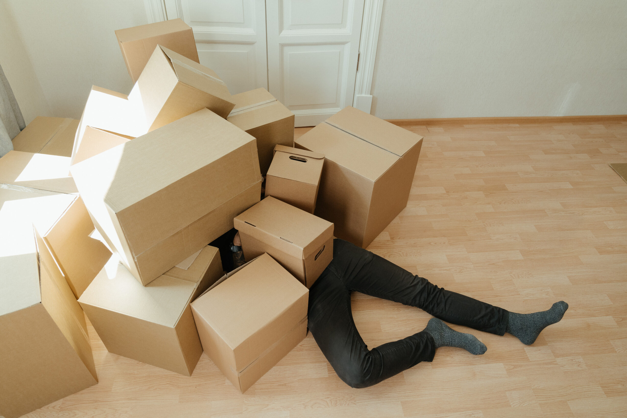 person covered with boxes